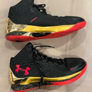 Under Armour Black and Gold High-Tops with Red Accents